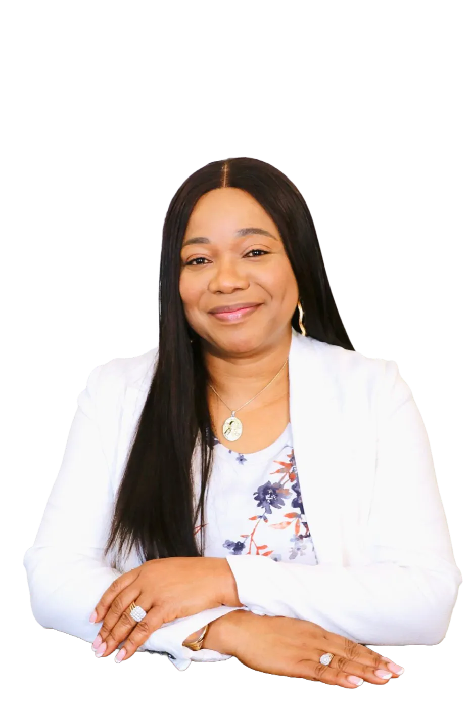 Co-Pastor Lola Adeosun of Kingdom Stars Assembly Guelph smiling in a white blazer with arms folded, studio portrait