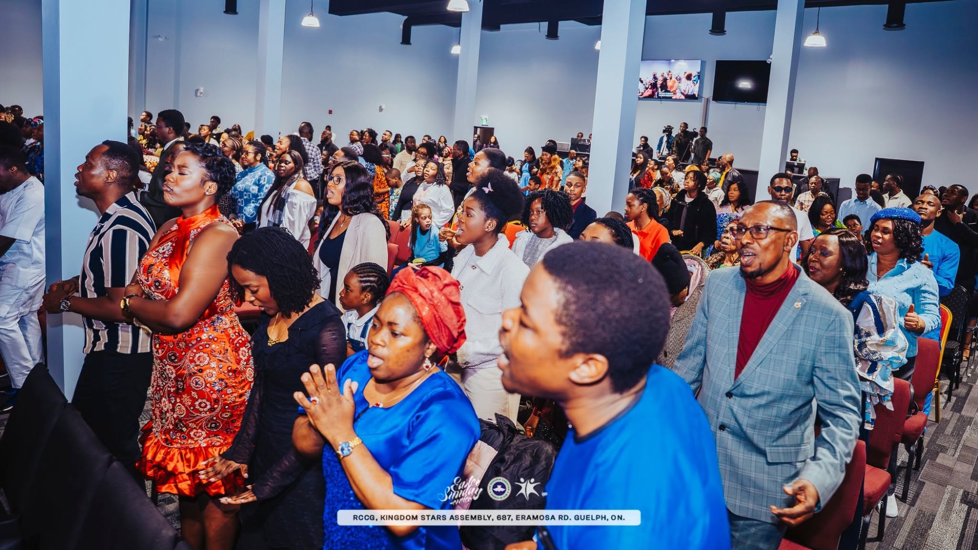 Church members worshiping in the sanctuary
